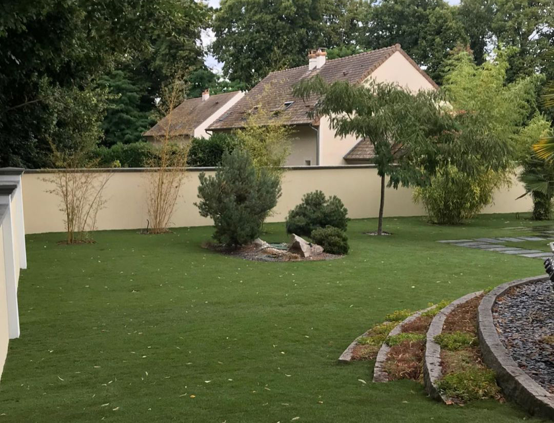 Création de jardin avec massif fleurie / Atmosphère Paysage dans l’Essonne.